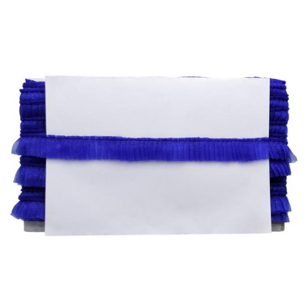 White clutch with blue ruffles on a white background
