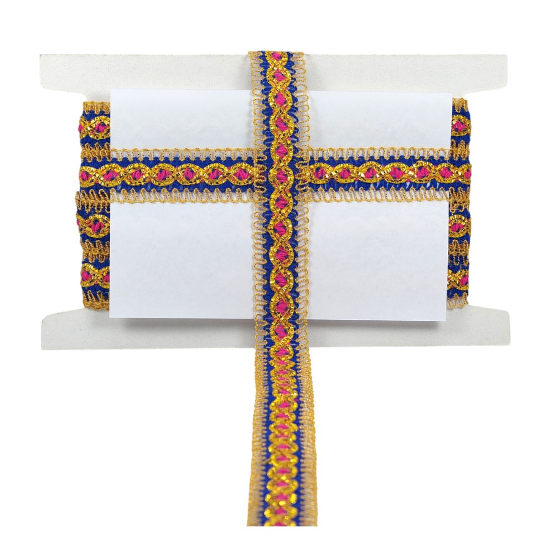 Decorative ribbon with blue, gold, and pink pattern on a white stand.
