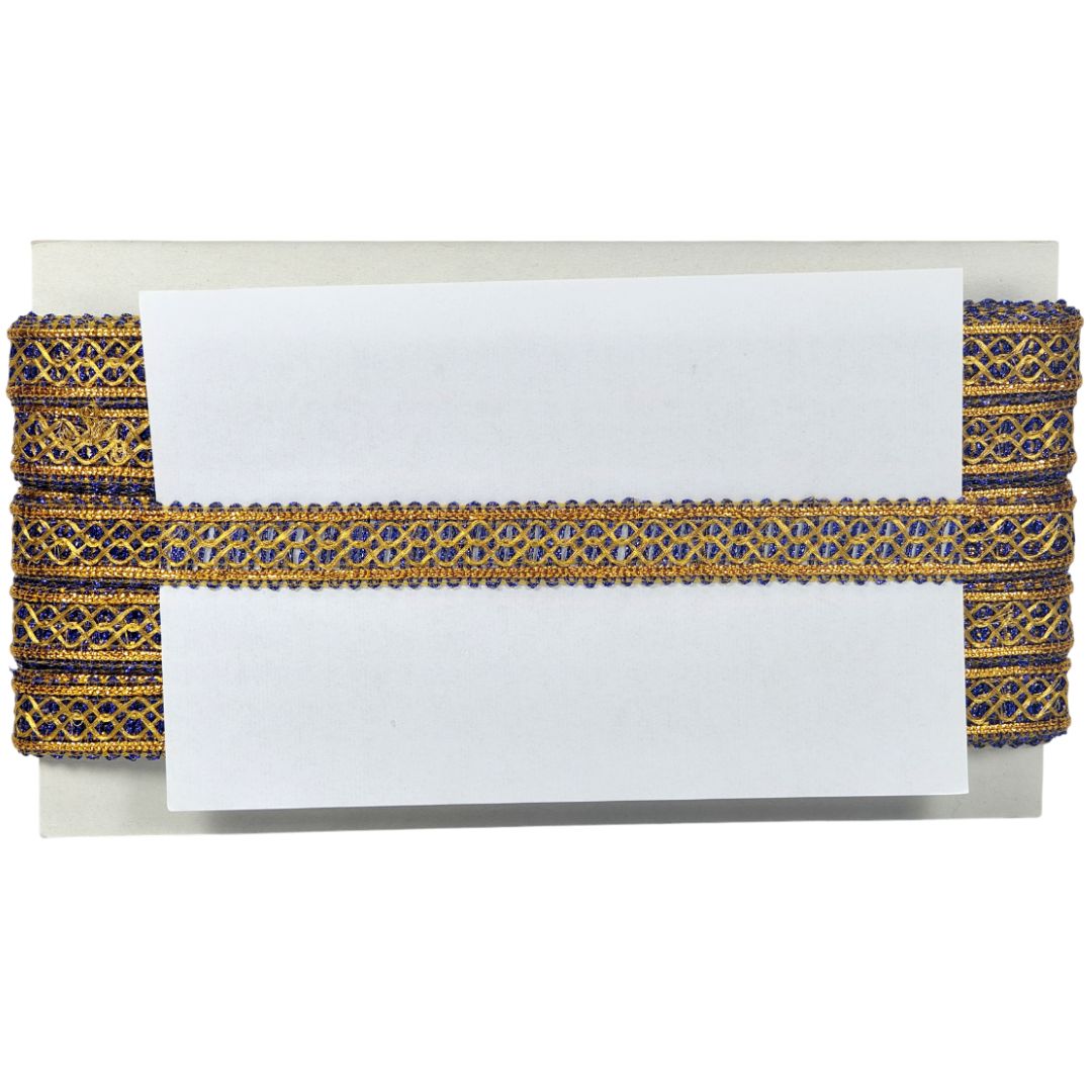 Decorative ribbon with gold and blue pattern on a white background