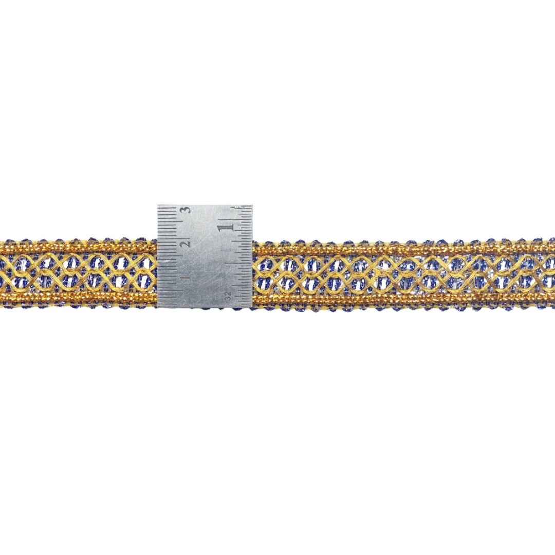 Gold and blue patterned belt with a measuring tape on a white background
