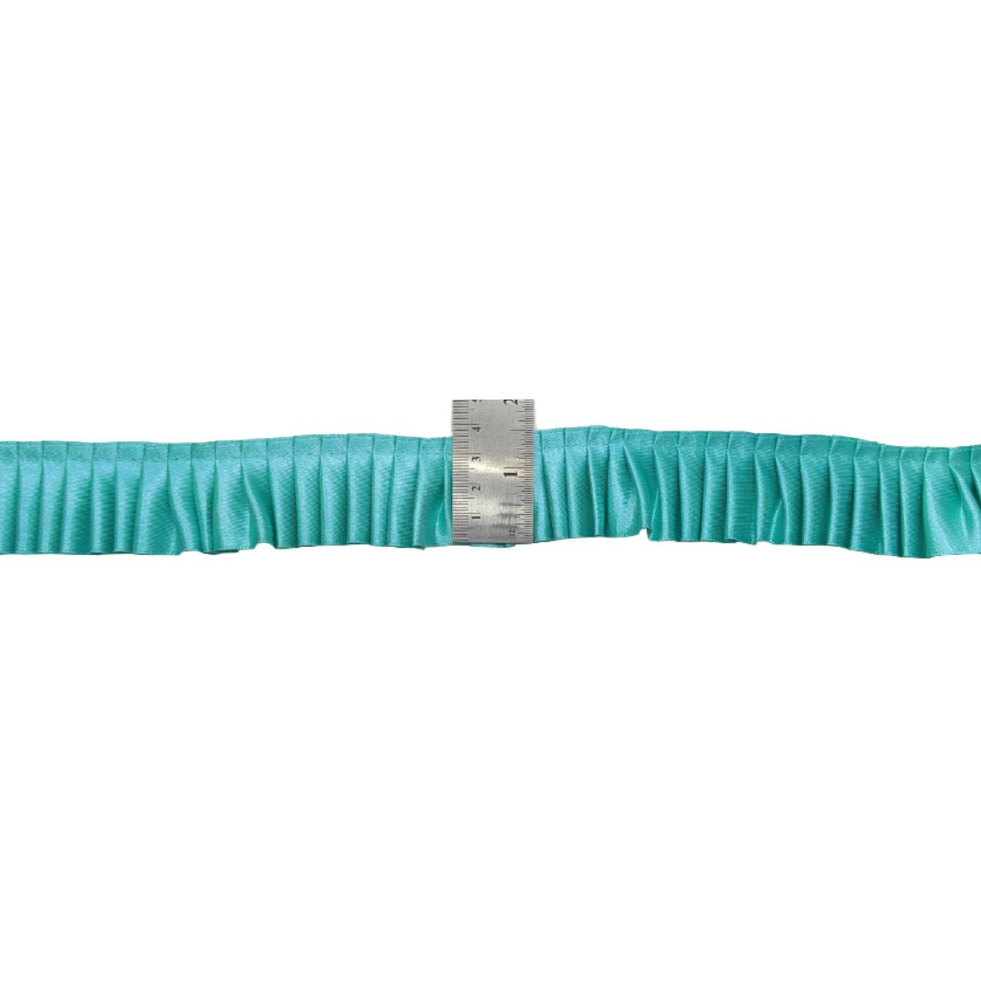 Turquoise belt with a silver buckle on a white background