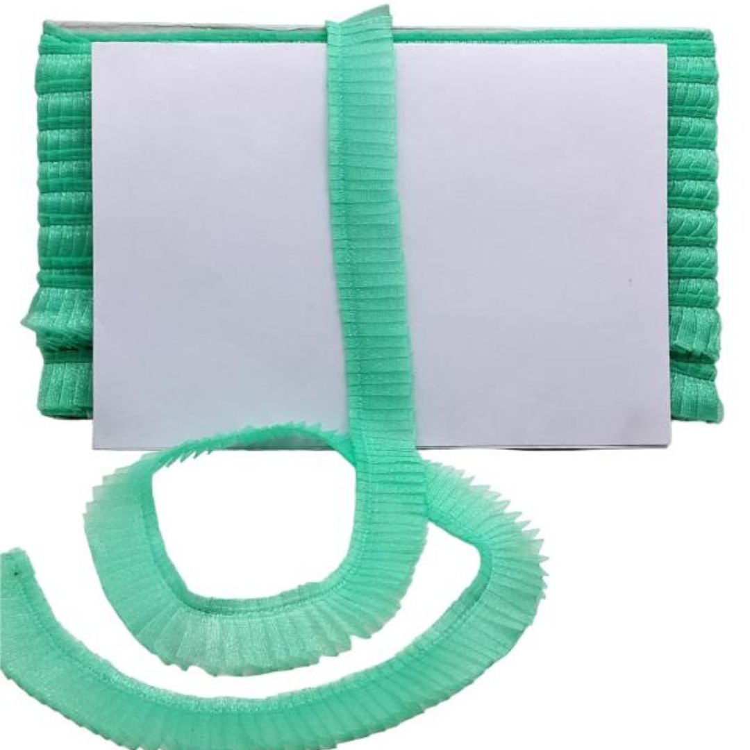 Green ribbed belt with a white card on a white background