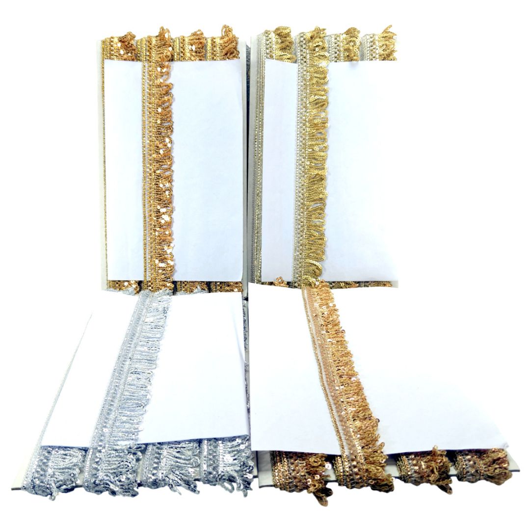 Decorative gold and silver trim on a white background