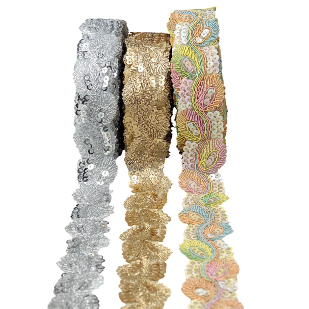Three decorative ribbons in silver, gold, and multicolored on a white background