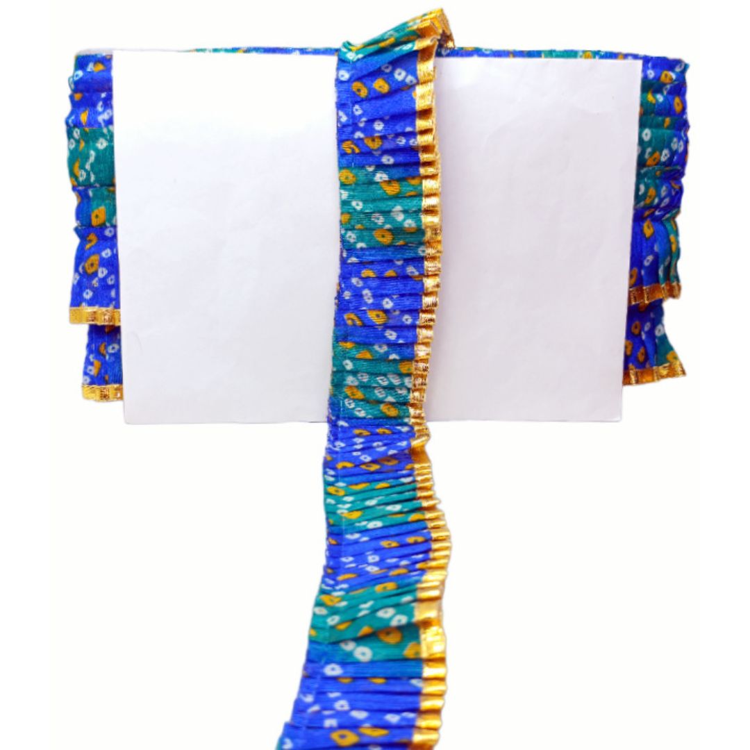 Colorful fabric with blue and green patterns on a white background