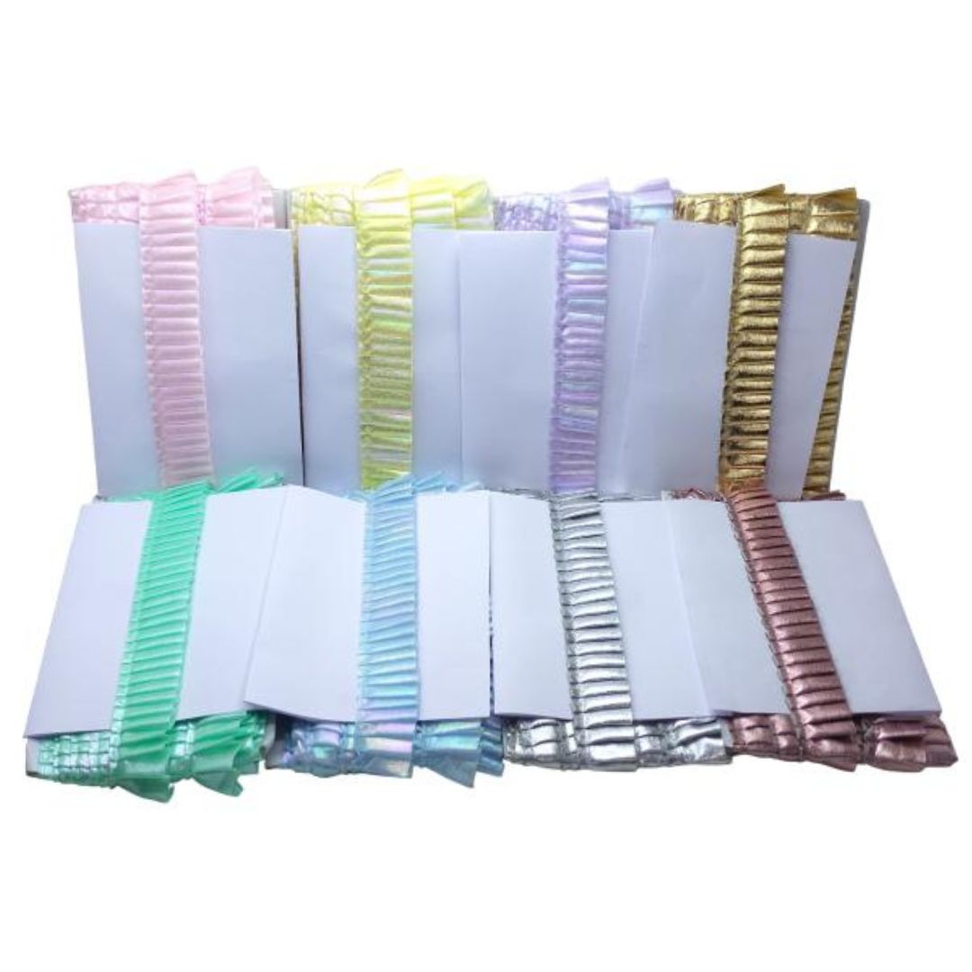 Collection of colorful poly mailers on a white background