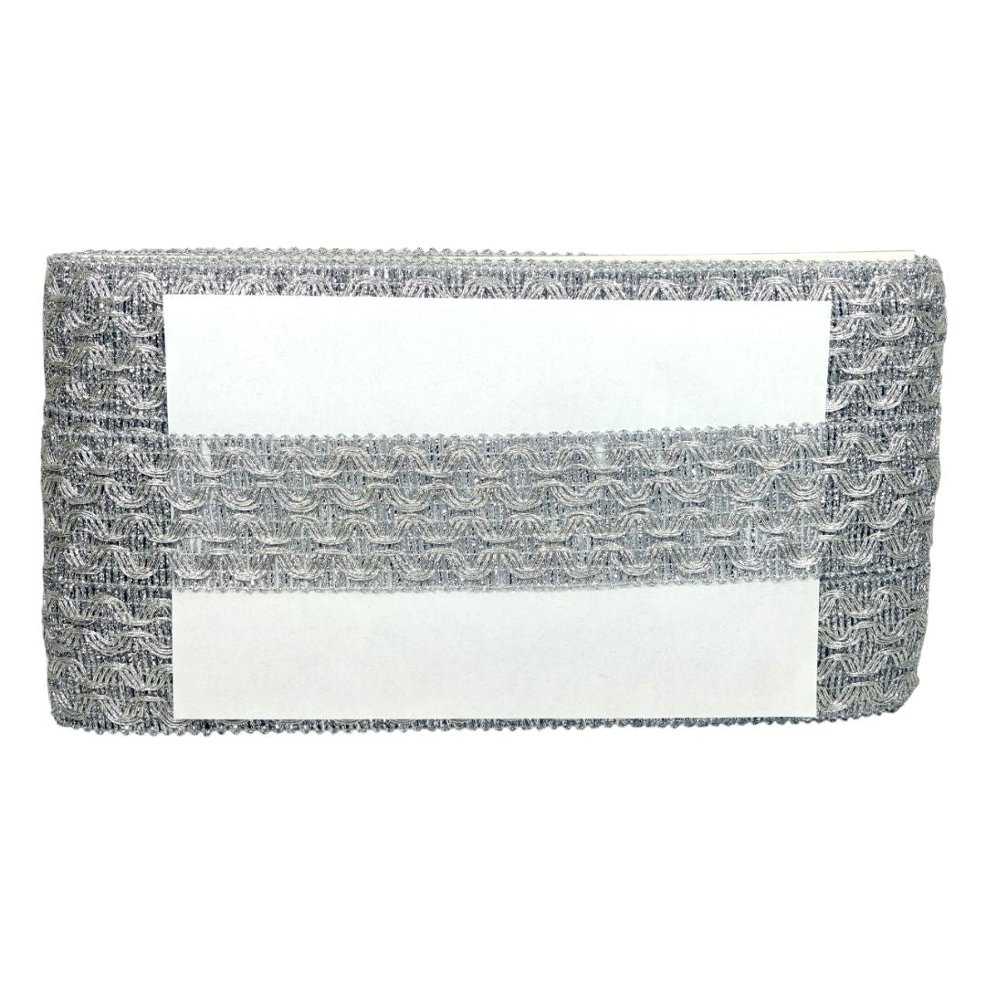 Gray textured clutch with a white interior on a white background