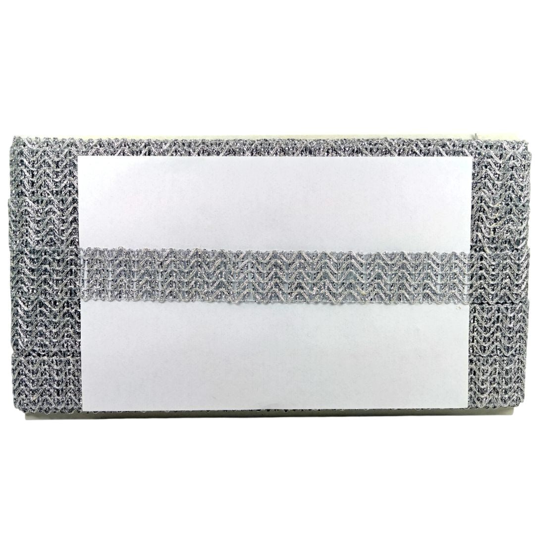 Rectangular cleaning pad with textured surface on a white background