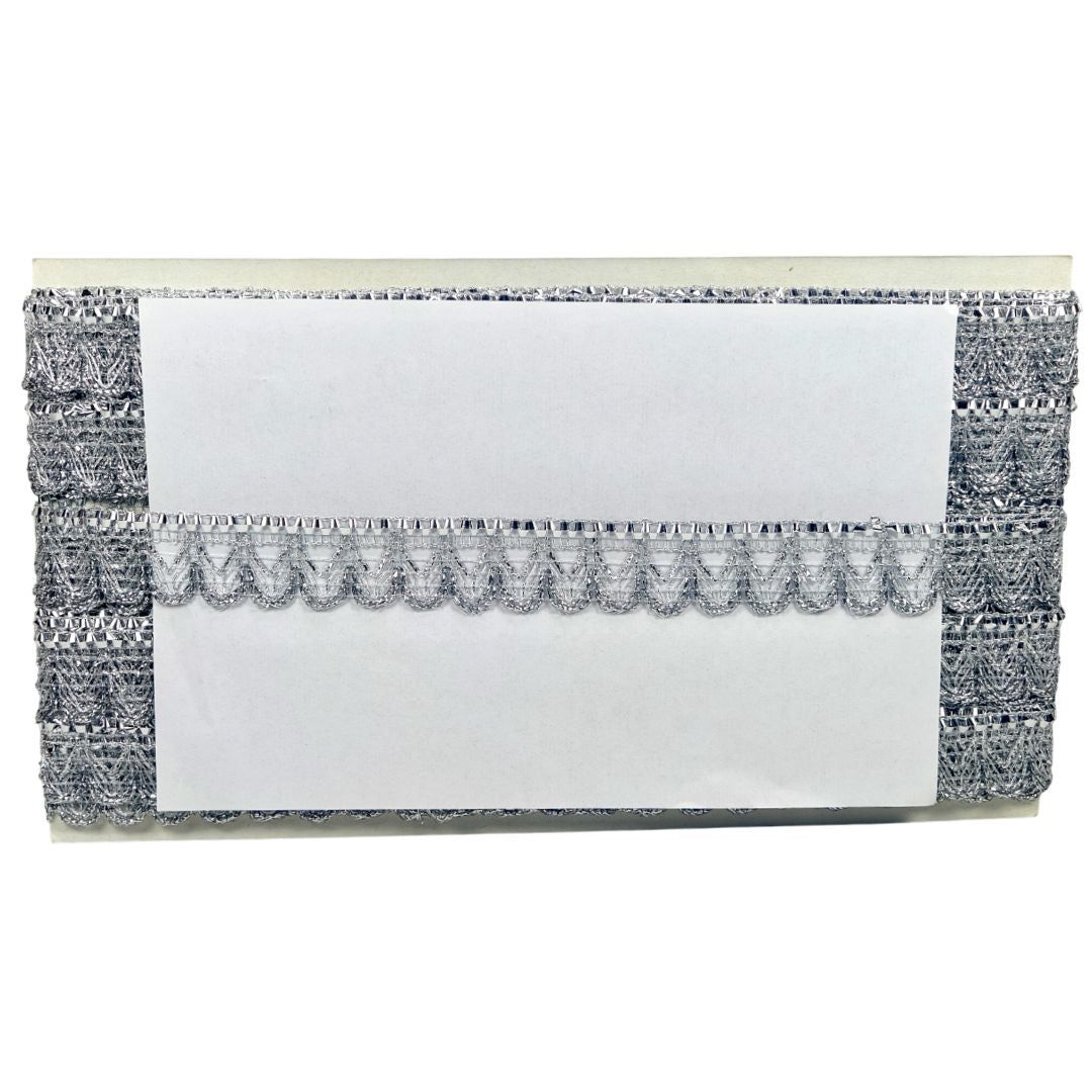 Clutch bag with textured black and white design on a white background