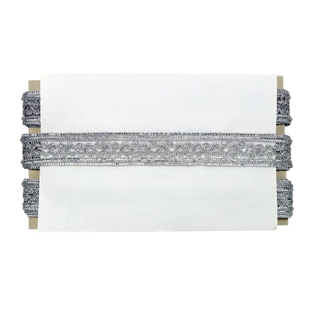 Decorative headboard with intricate patterns on a white background