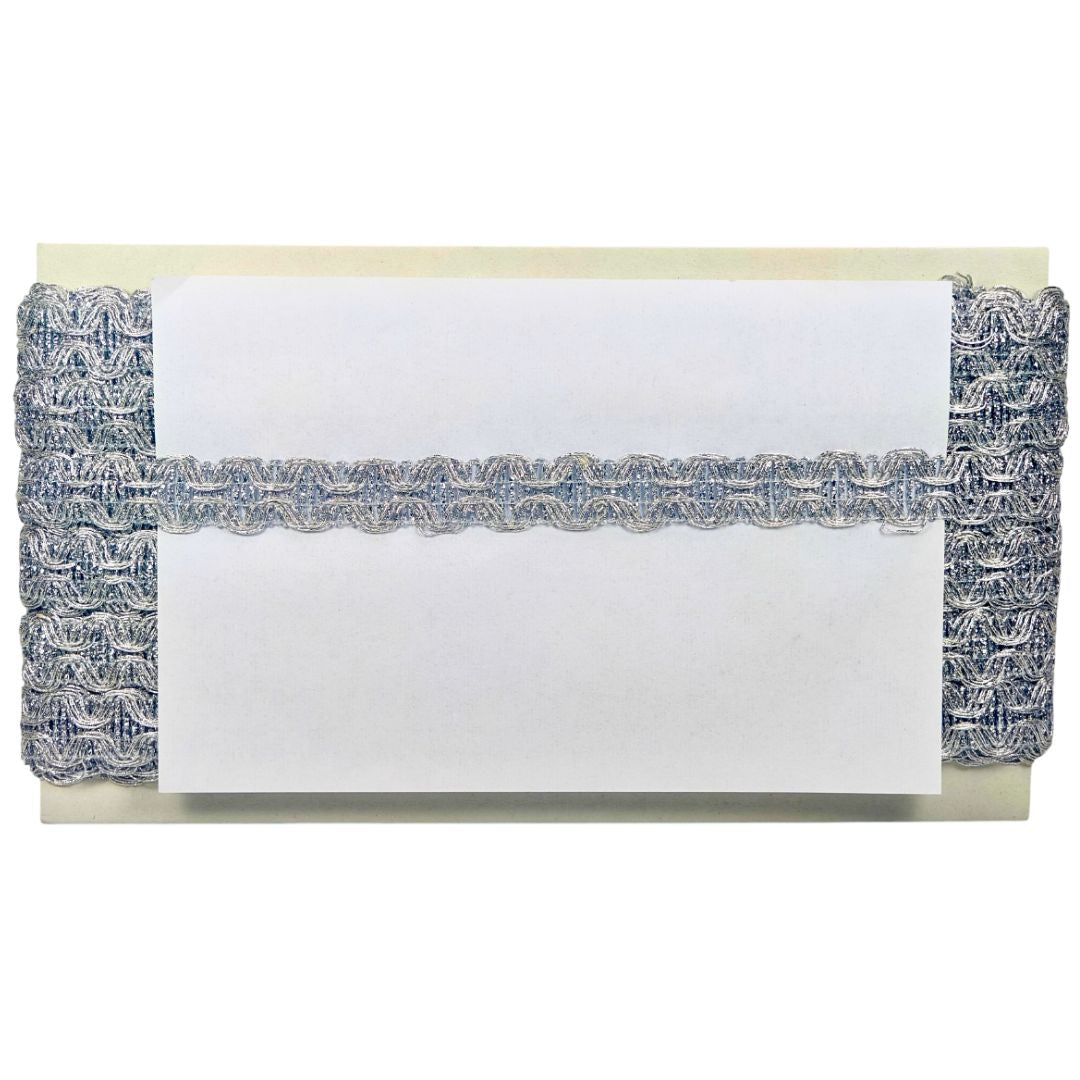 Decorative clutch with textured pattern on a white background