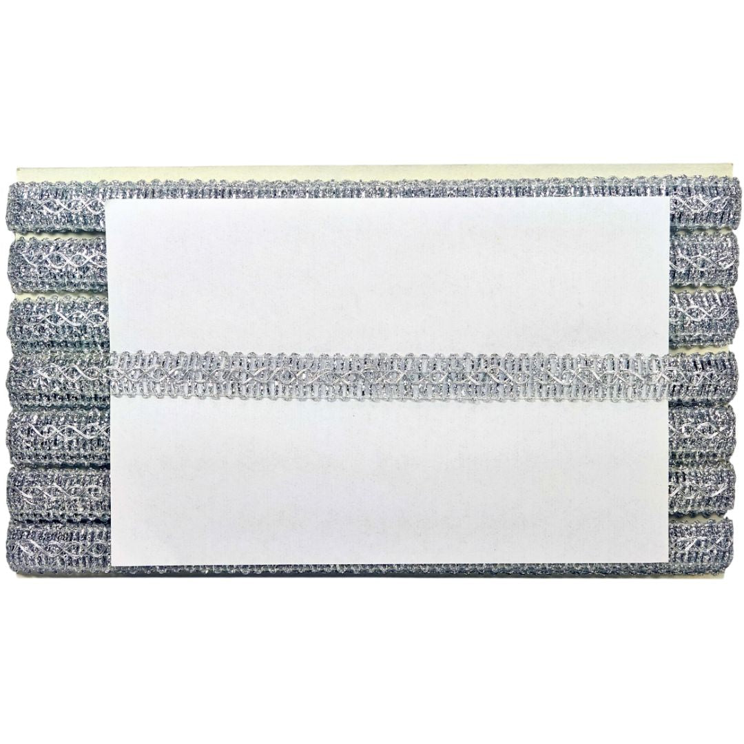 Stack of gray and white folded towels on a white background