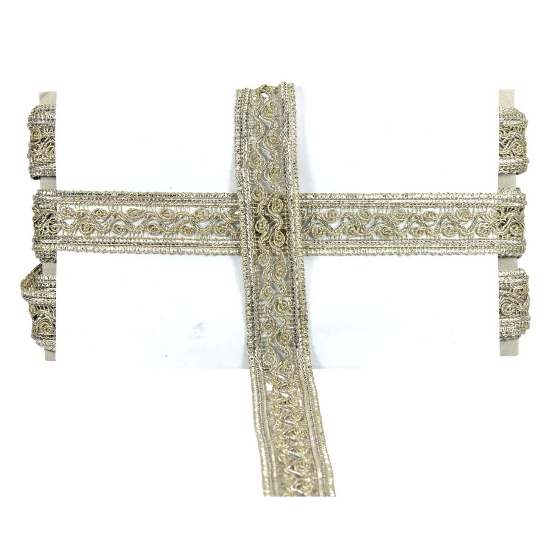 Decorative silver cross on a white background