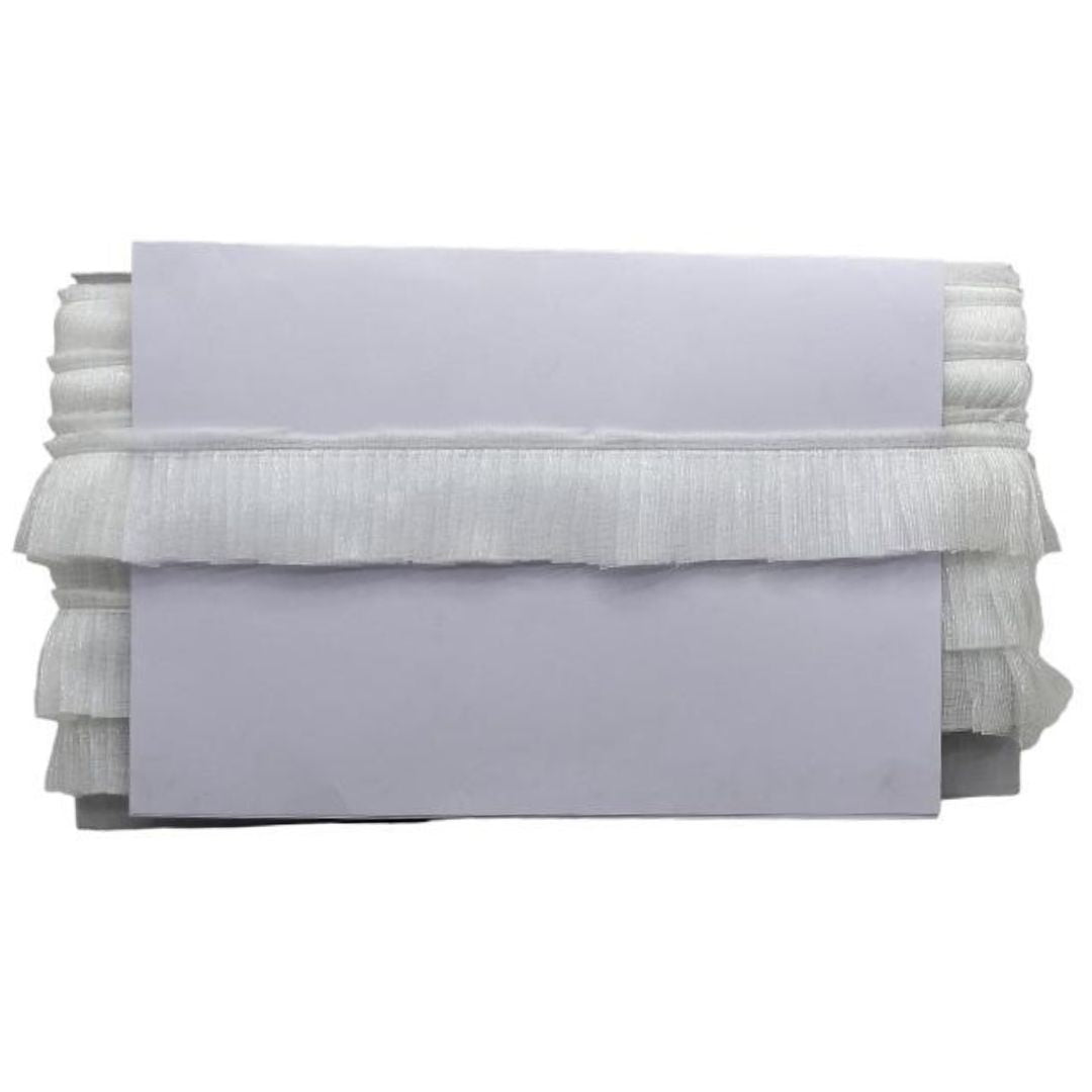Stack of white folded towels on a white background