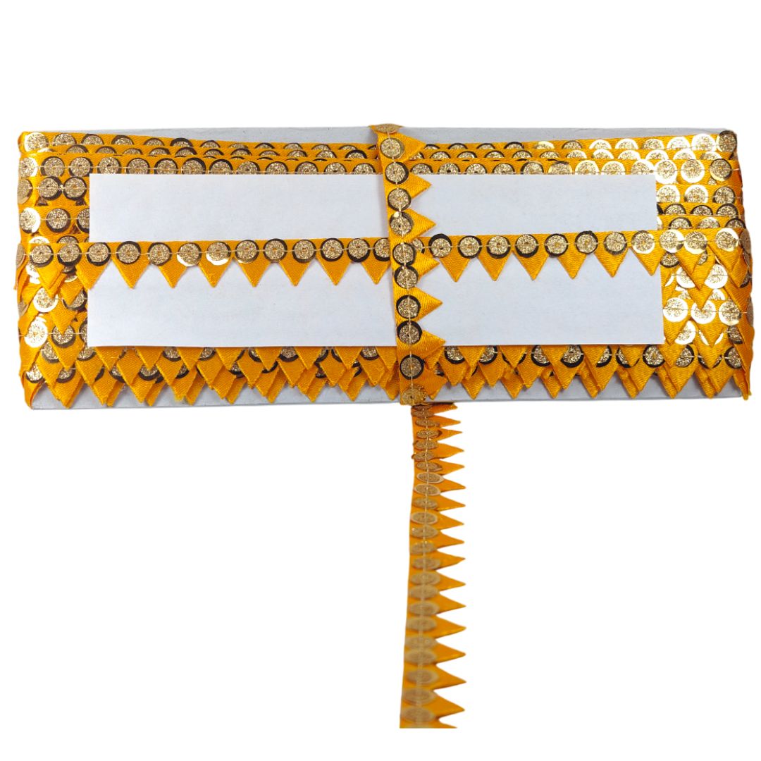 Decorative clutch with yellow and white pattern on a white background