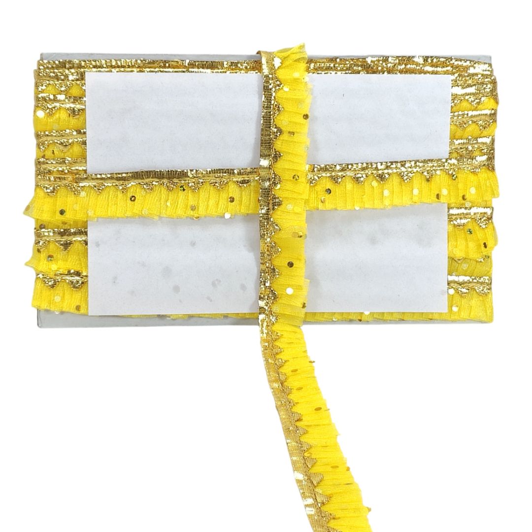Decorative yellow and gold ribbon with marble pattern on a white background