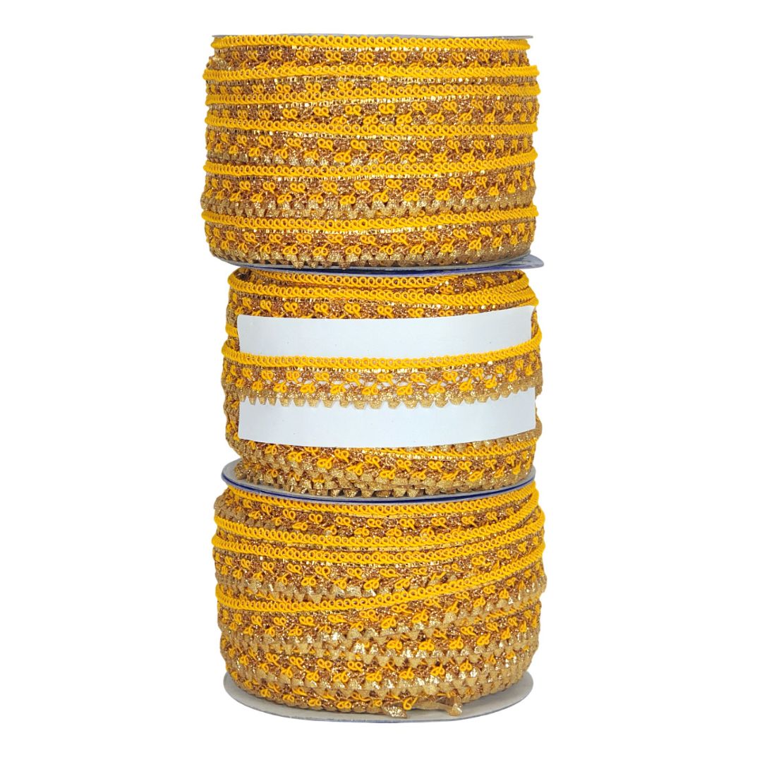 Stack of yellow bangles with intricate designs on a white background