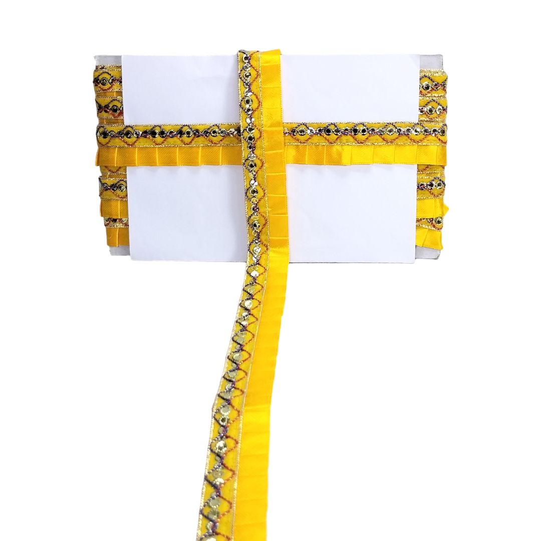 Yellow and white decorative border with intricate patterns on a white background