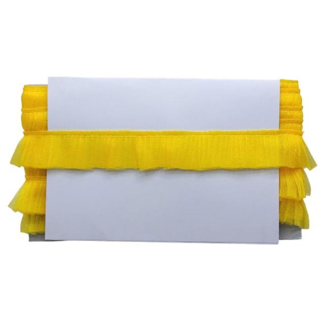 White card with yellow ruffled trim on a white background