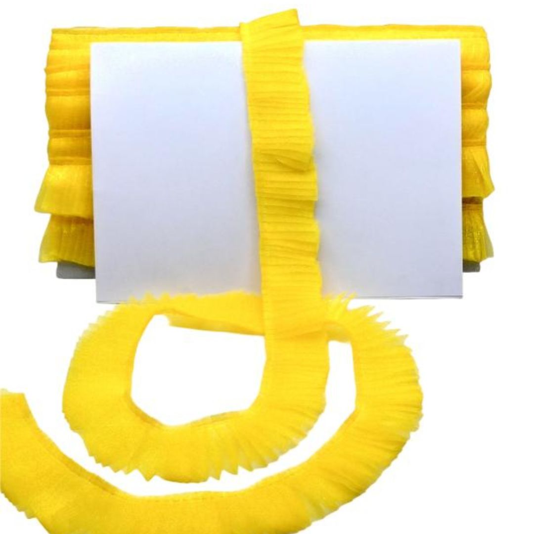 Yellow shower curtain with white liner on a white background