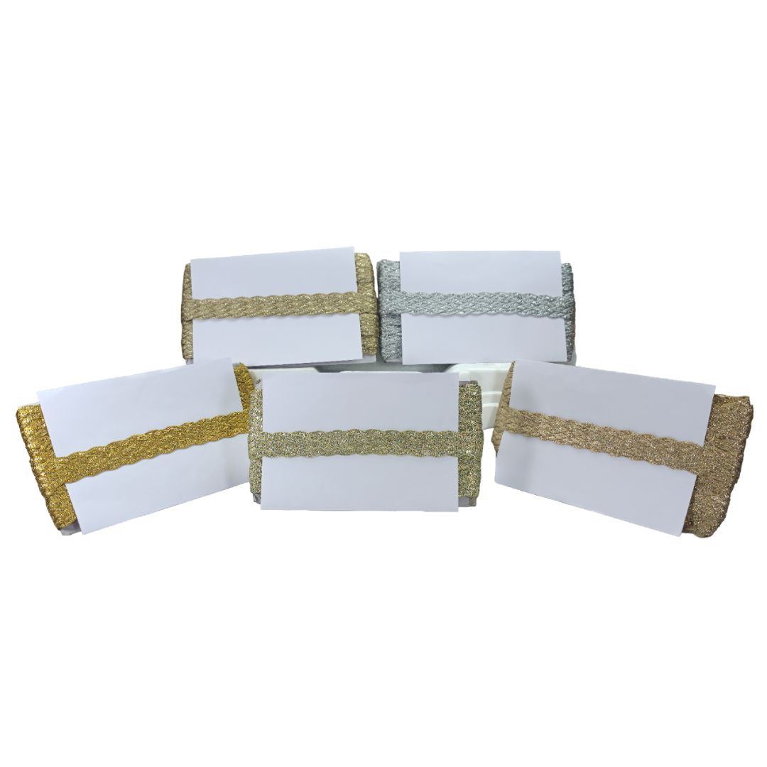 Set of white cards with gold and green ribbons on a white background