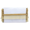 Decorative tablecloth with gold trim on a white background