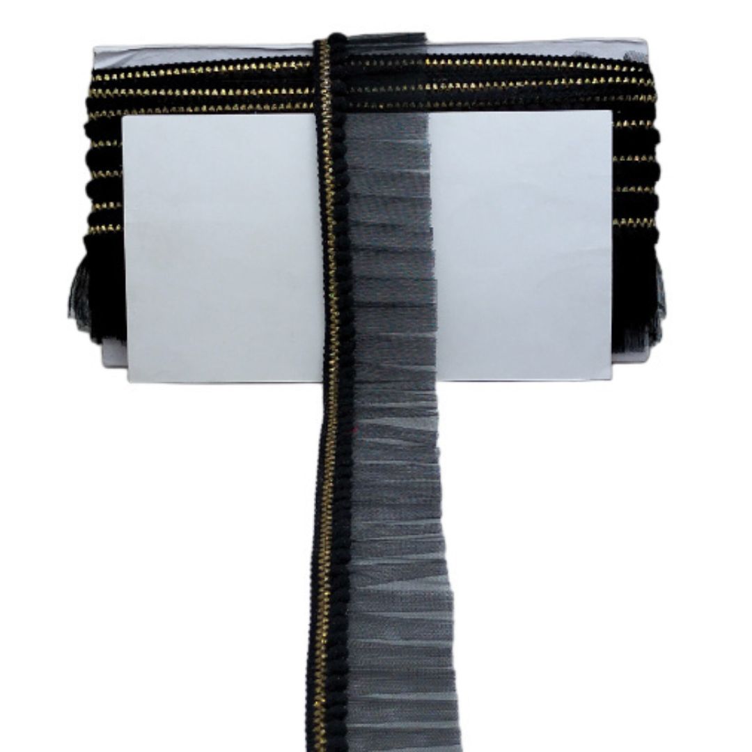 Black hair extensions with gold zip ties on a white background