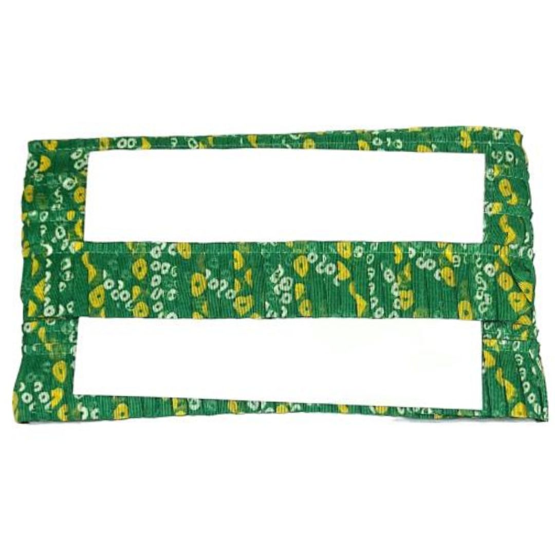 Two green fabric frames with yellow patterns on a white background