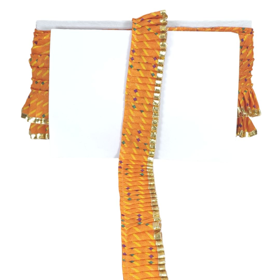 Orange saree with gold border on a white background
