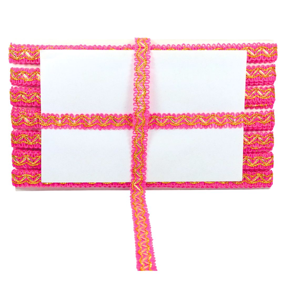 Pink and yellow woven mat with three white squares on a white background