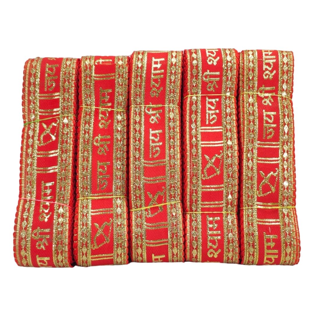 Red fabric with gold embroidery and text on a white background