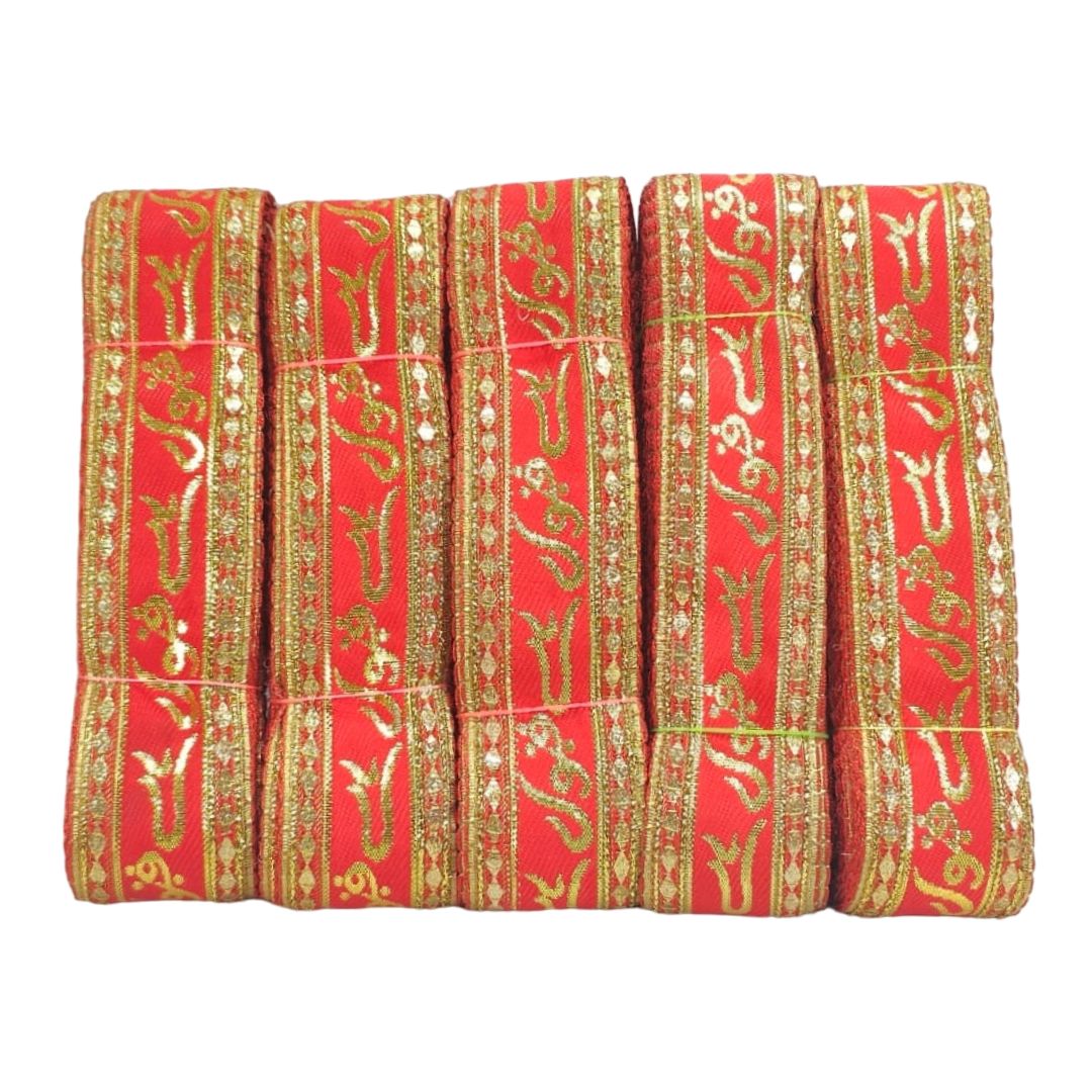 Red fabric with gold embroidery on a white background