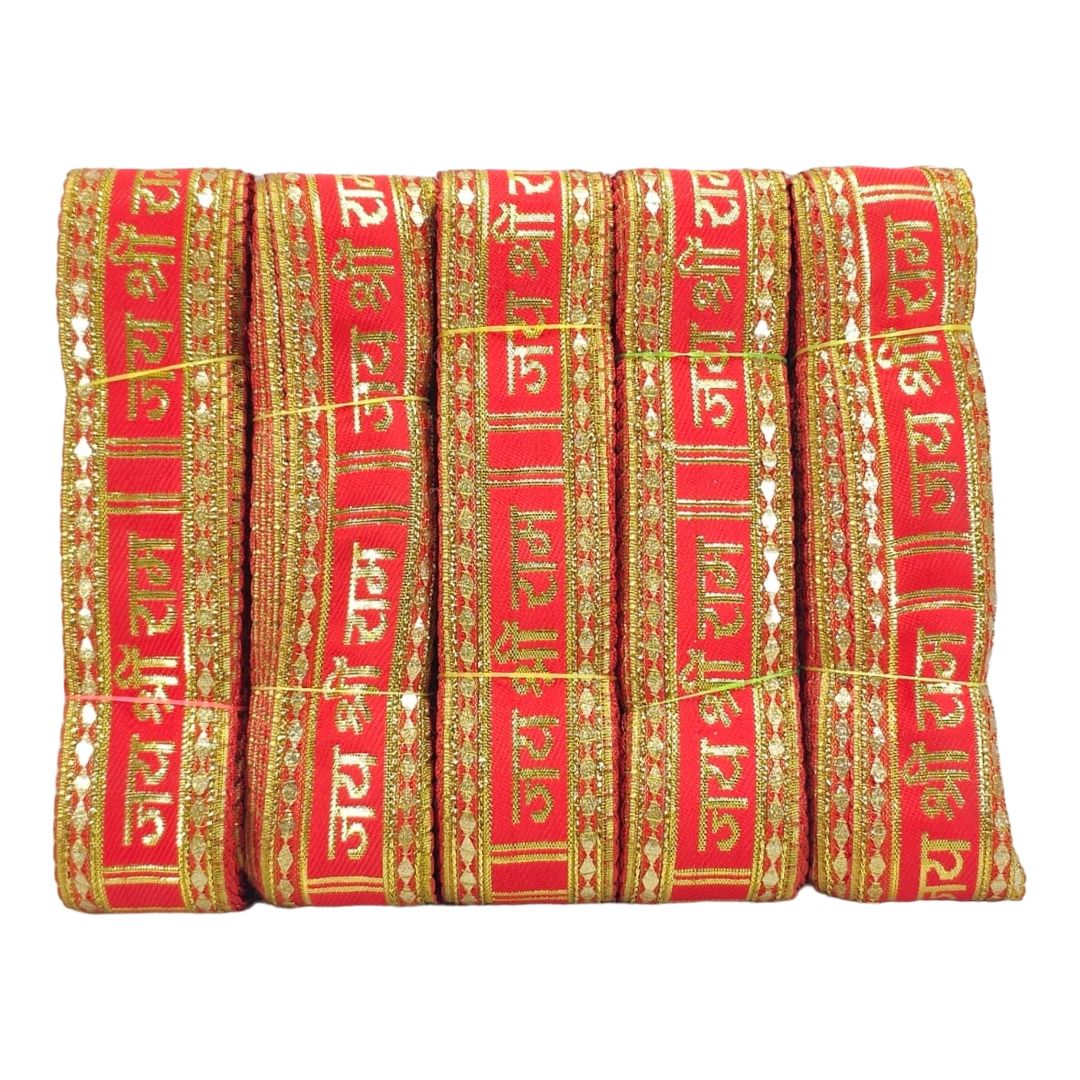Red and gold fabric with text and patterns on a white background