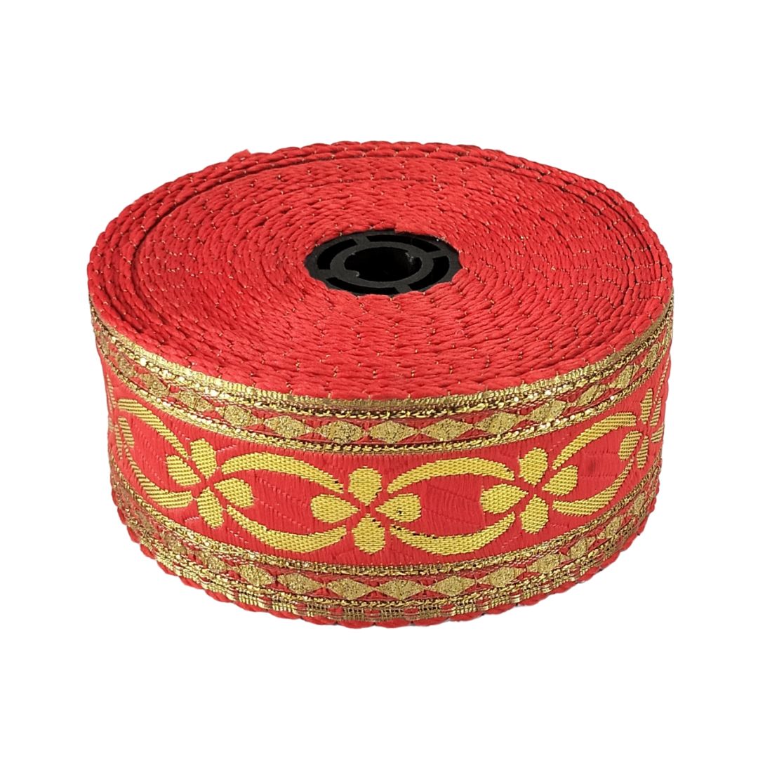 Red ribbon with gold pattern on a white background