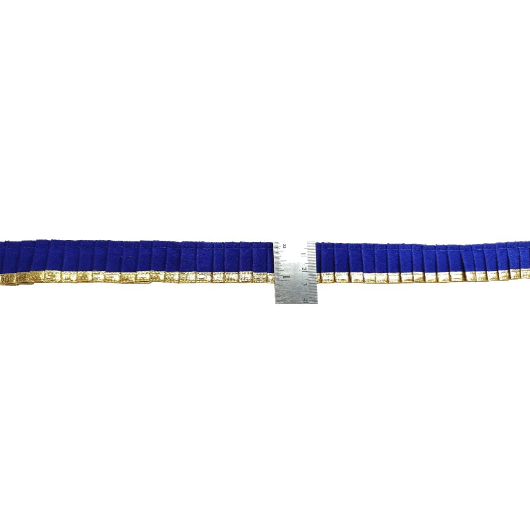 Blue belt with a ruler for size reference on a white background