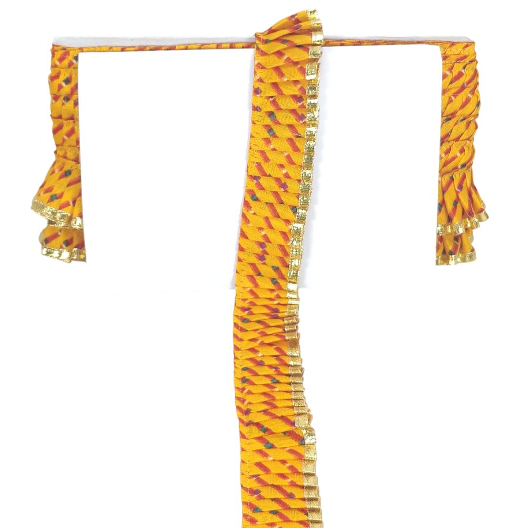 Yellow saree with a pattern on a white background