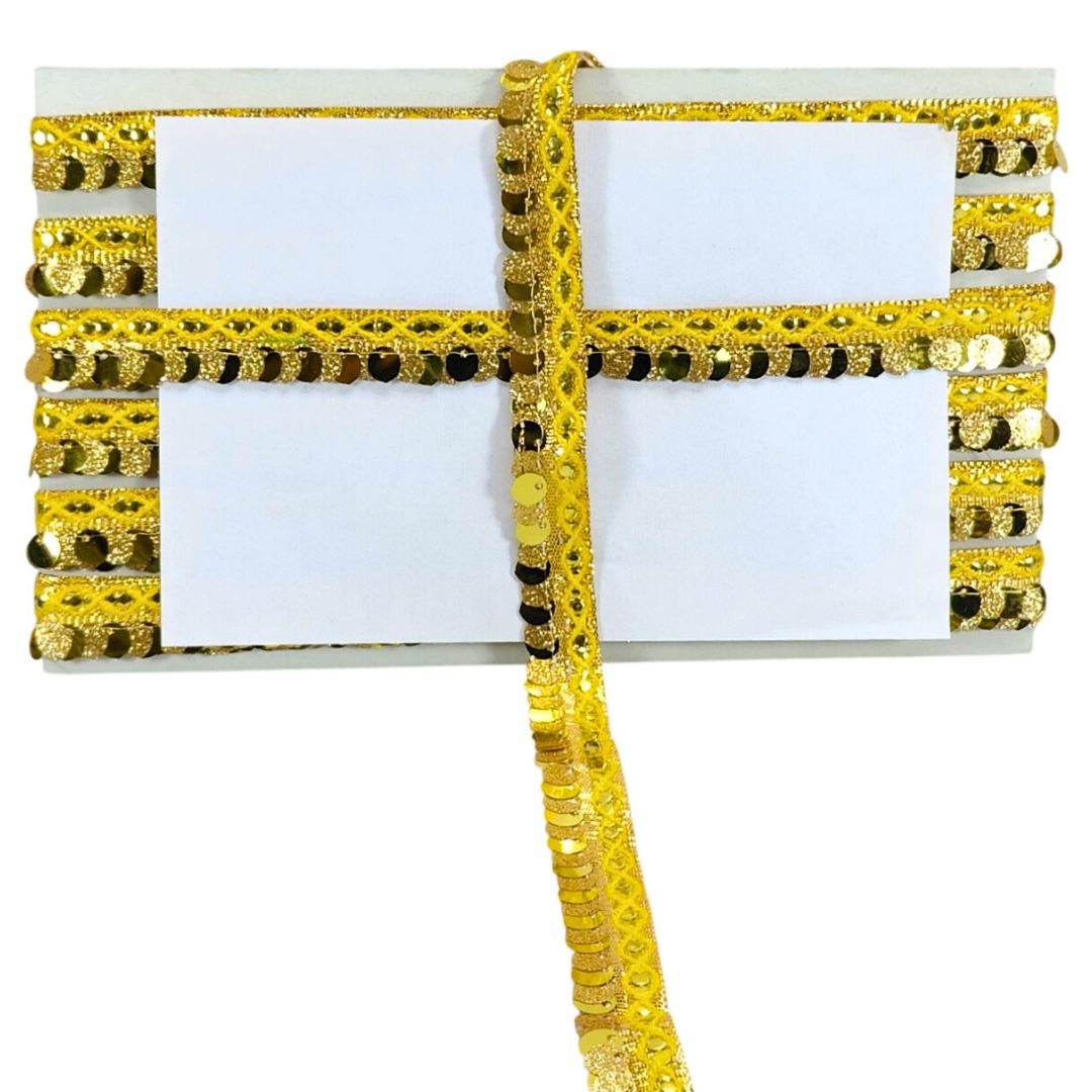 Gold and black decorative ribbon on a white background