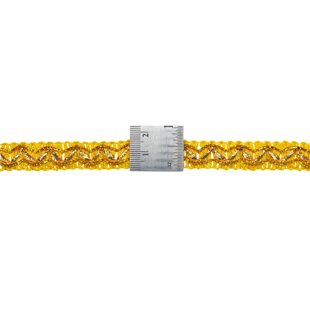 Gold braided cord with a measuring tape on a white background